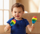 Child playing with maracas from Melissa & Doug Band in a Box - Clap, Clang, Tap. Available from tenlittle.com