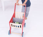 Child pushing Bigjigs Shopping Cart. Available from www.tenlittle.com.