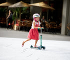 Little Girl Using Micro Kickboard Mini Deluxe Eco Scooter - Mint - Available at www.tenlittle.com